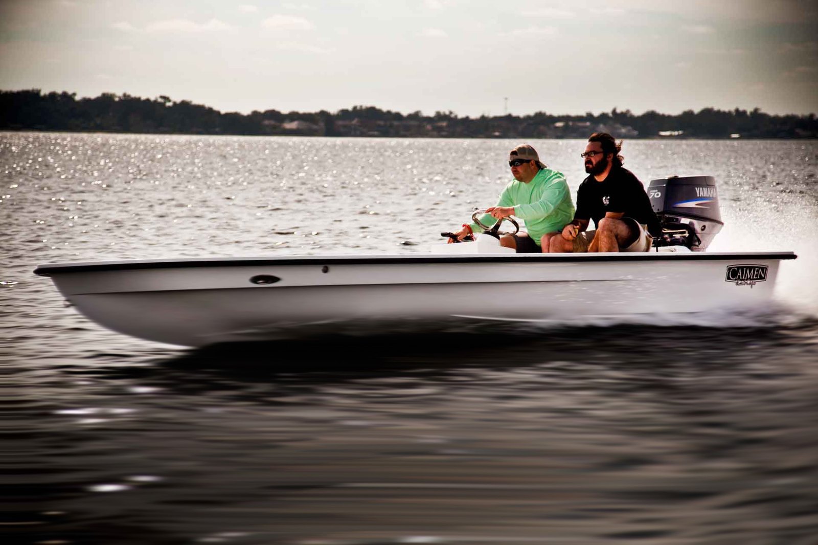 Caimen underway with a Yamaha 70 — two up and running easy