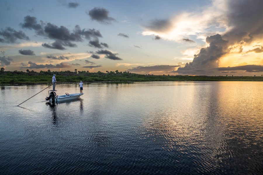 Tanner Severt poling his 17 EVO V across the Mosquito Lagoon at first light