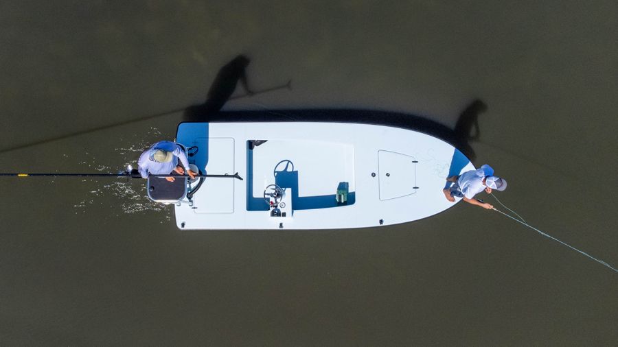 Top-down drone view of the 17 EVO V with two anglers aboard