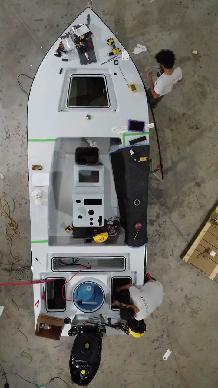 Overhead view of an EVO being rigged on the East Cape shop floor